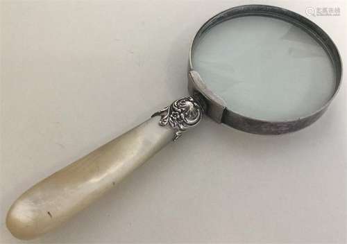 A silver and MOP magnifier. Approx. 133 grams. Est