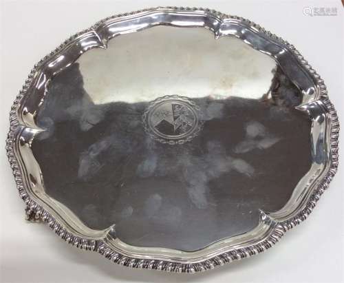 A George III silver crested salver with gadroon ri