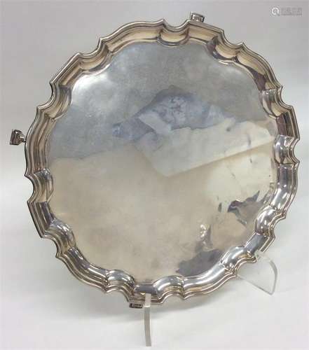 A circular pie-crust silver salver. Birmingham. By