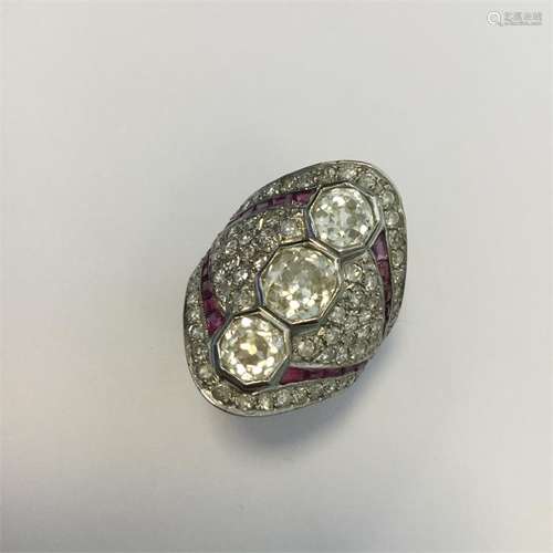 A large ruby and diamond cocktail ring, the large