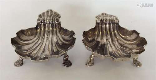 A pair of early Georgian silver shell-shaped salts