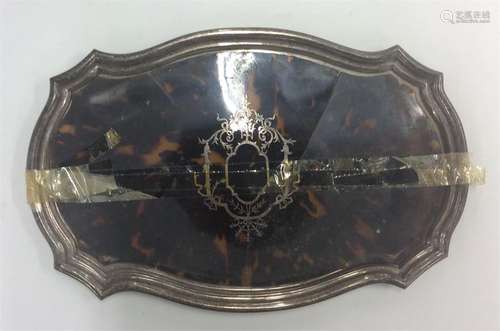 A silver and tortoiseshell dressing table tray wit