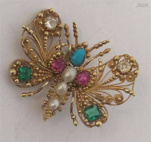 A good Antique small butterfly with diamonds, emer