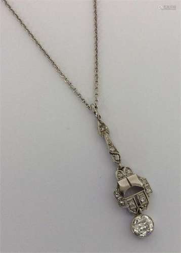 A stylish diamond pendant with loop top and rubove