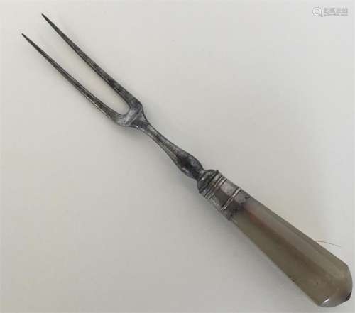 An Antique silver mounted two prong fork with tape