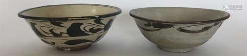 A Chinese Cizhou pottery bowl painted in dark and