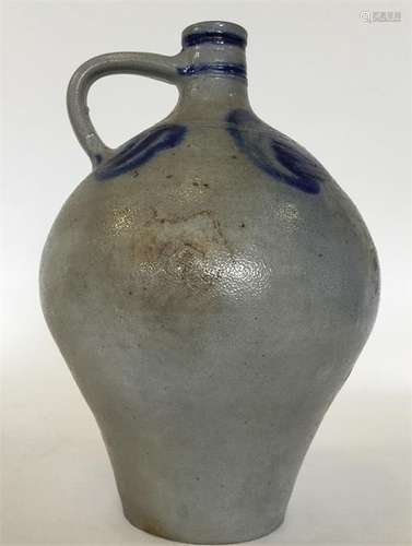 A large French Delft flagon in blue-ground with lo