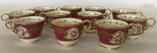 Eleven English porcelain claret-ground fluted teac