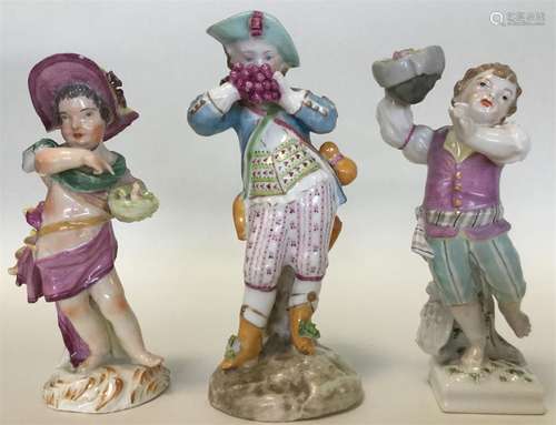 Three Continental brightly decorated figures of ch