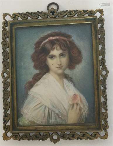 A rectangular miniature of a lady with wavy hair o
