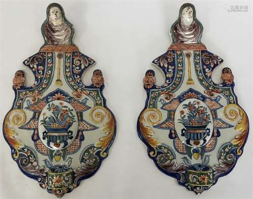 A pair of Dutch Delft polychrome shield-shaped wal