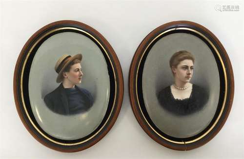 A pair of German porcelain large oval plaques fine