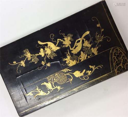 A lacquer boxed travelling set decorated with vine