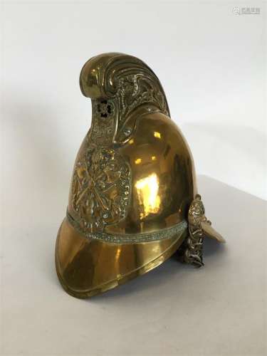 A heavy brass Merryweather Fireman's helmet. Est.
