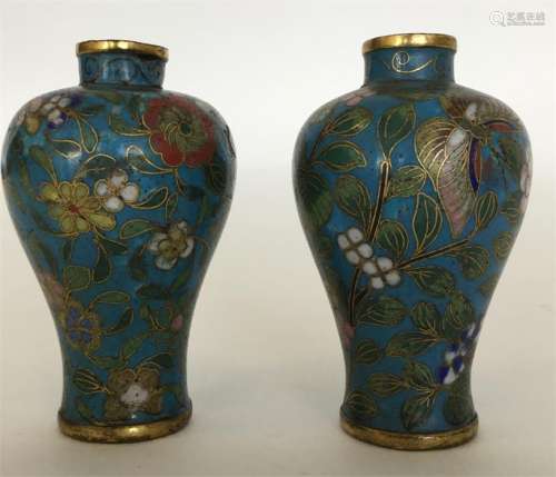 A good pair of Antique cloisonné vases decorated w