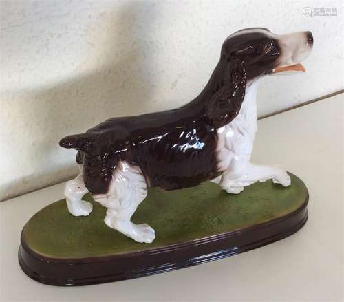 BESWICK: A figure of a liver and white spaniel on