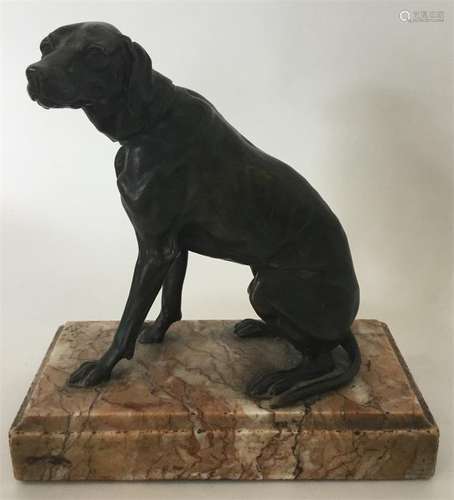 A good quality bronzed figure of a dog in seated p