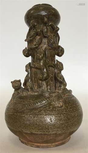 An early Japanese funeral vase in brown, decorated