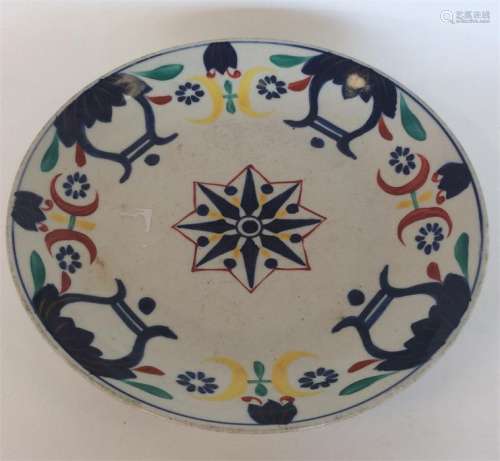 A large Japanese porcelain saucer dish brightly pa