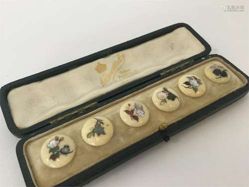 A boxed set of six Japanese Shibayama buttons deco