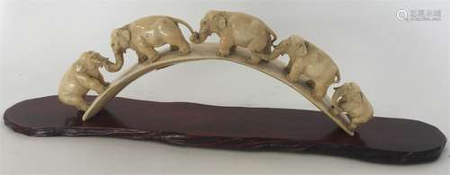 An Edwardian carved ivory bridge mounted with five