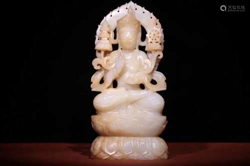 A JADE CARVING OF SEATED GUANYIN