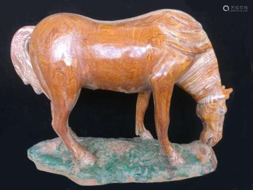 A MARBLE-BROWN GLAZE FIGURE OF HORSE