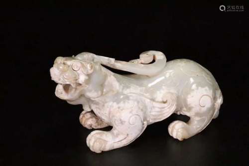 A JADE CARVING OF THE MYTHICAL ANIMAL