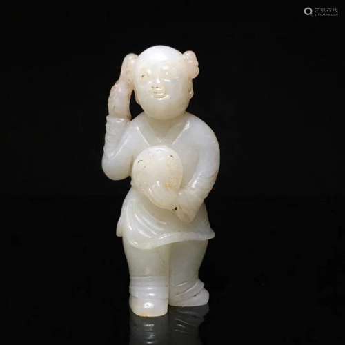 A JADE FIGURE OF A CHILD