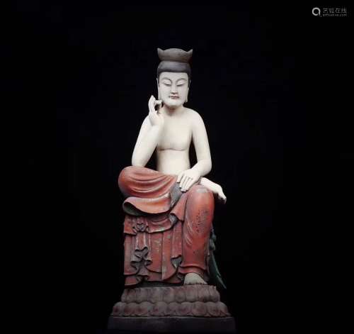 A XIANGZHANG WOOD FIGURE OF BUDDHA