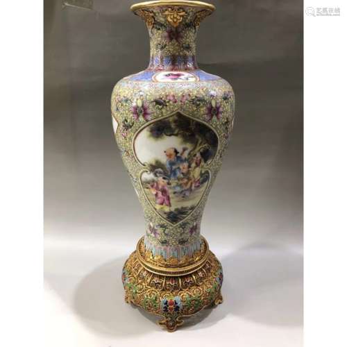 A FAMILLE ROSE VASE WITH BRONZE BASE