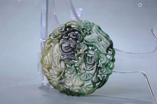 A ROUND SHAPED OLD JADEITE PENDANT