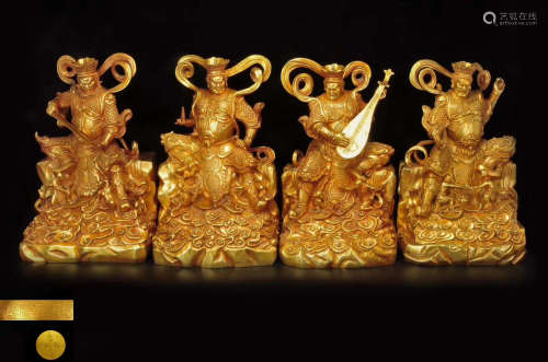 FOUR GILT BRONZE MOLDED GOD STATUES WITH MARK