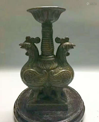 A YUEYAO TEADUST GLAZED CANDLESTICK