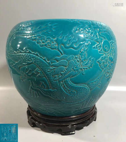 A LIGHT BLUE GLAZED DRAGN INCISED DESIGN POT