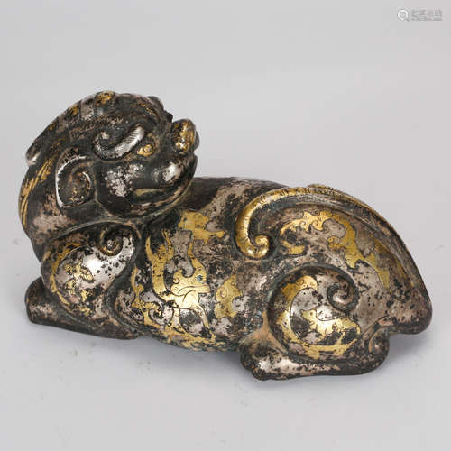 CHINESE GILT AND SILVER OVER BRONZE BEAST