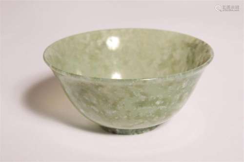 Delicate carved jadite bowl with flared rim