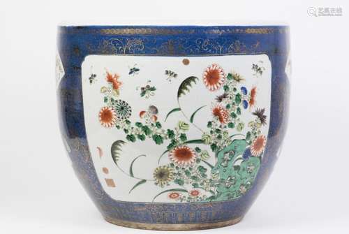 A LARGE BLUE-GROUND FAMILLE ROSE SCROLL POT