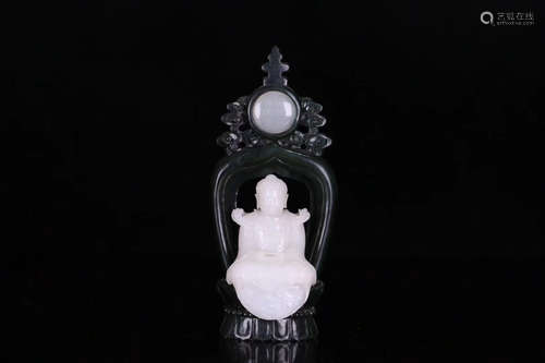 A HETIAN JADE CARVED BUDDHA FIGURE