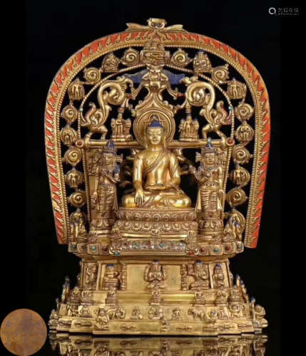 A GILT BRONZE MOLDED NEPAL TYPE BUDDHA STATUE