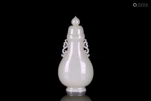 A HETIAN WHITE JADE CARVED VASE