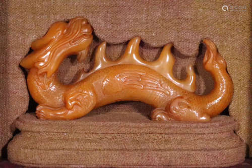A TIANHUANG SOAPSTONE CARVED BEAST PENDANT
