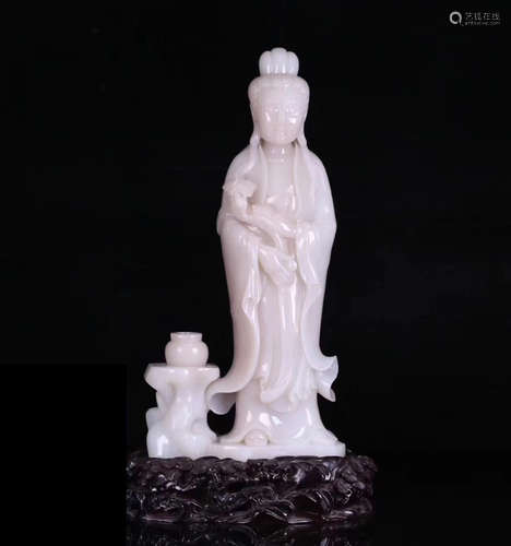 A HETIAN JADE CARVED GUANYIN STATUE