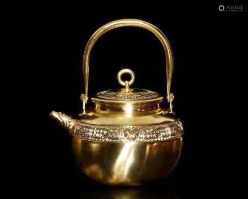 A GILT SILVER MOLDED HANDLE POT