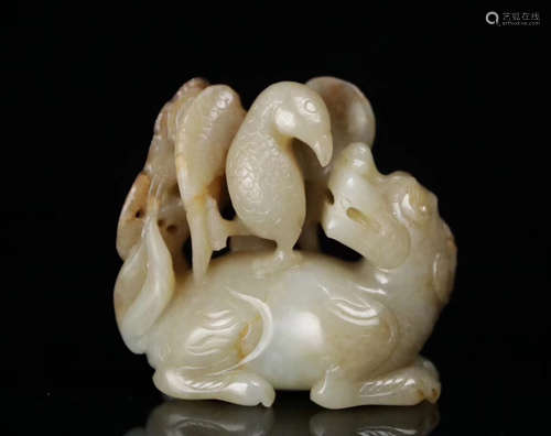 A HETIAN JADE LUCKY BEAST PENDANT