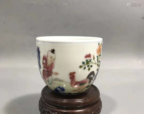 A FANGGU BOY AND ROOSTER PATTERN CUP