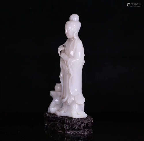 A HETIAN JADE MOLDED GUANYIN STATUE