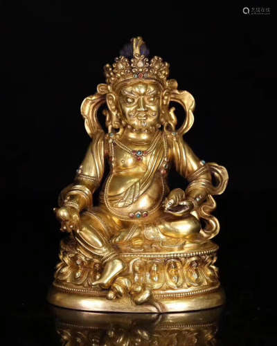 A BRONZE GILTED WEALTH OF GOD FIGURE