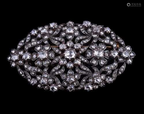 A mid 19th century diamond brooch, the oval pierced gold backed silver foliate panel set with rose