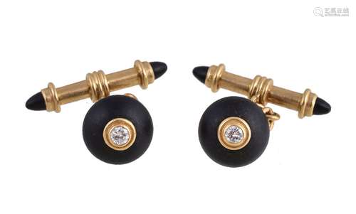 A pair of 18 carat gold, onyx and diamond cufflinks by Deakin & Francis, the circular onyx panels